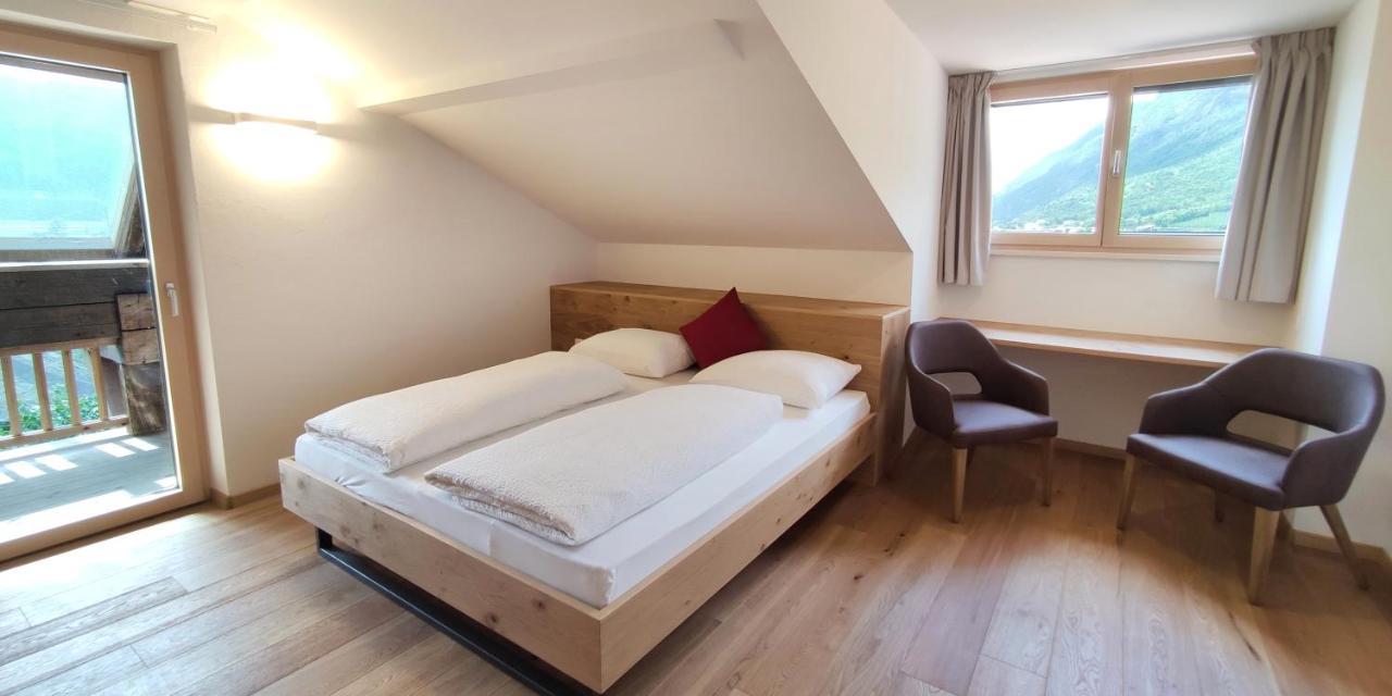 Mittelbergerhof Ferienwohnungen Vilpiano Esterno foto