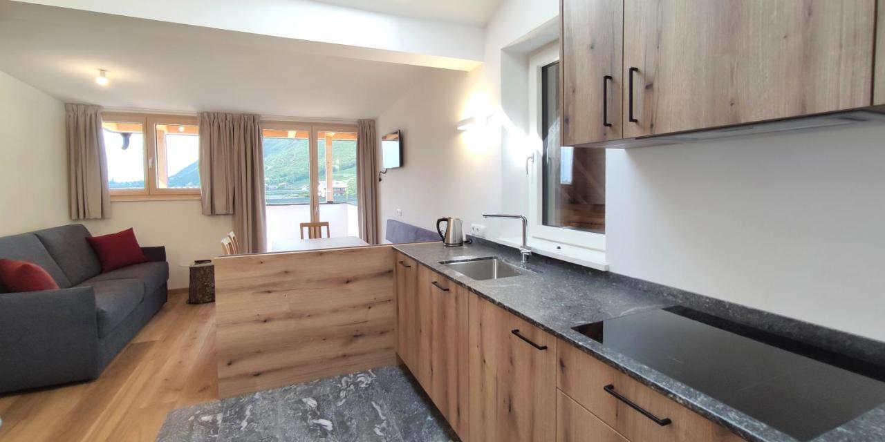 Mittelbergerhof Ferienwohnungen Vilpiano Esterno foto